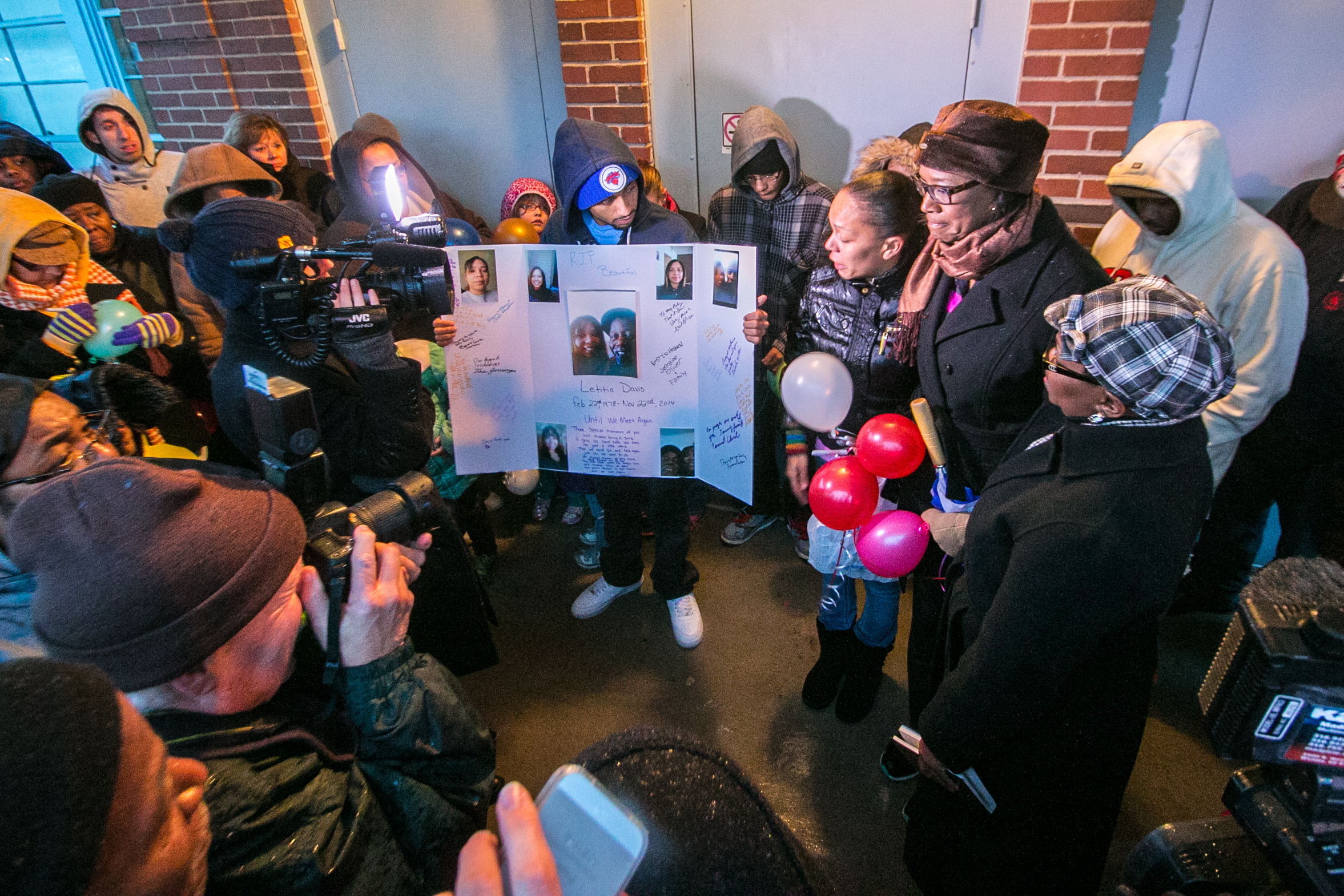 Community members gather at Fairmount Park to host a vigil for Letitia Davis, a victim of being assaulted, raped and set on fire at Fairmount Park on Nov. 14, 2014. Davis died Nov. 22.